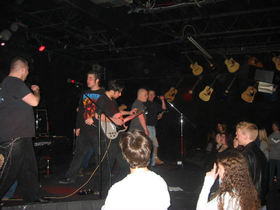 013mikeplayingwithhishandupsidedownyeah.jpg